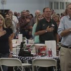 Getting things started with the Pledge of Allegiance.